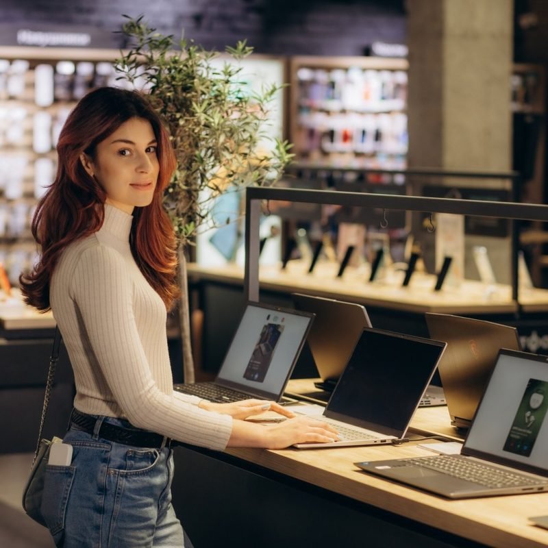 woman-buying-a-laptop-in-store.jpg